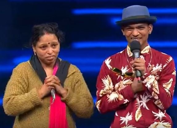 Ajay Tiger Pop with his mother