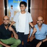 Rajiv Laxman with his son and brother