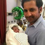 Sarfraz Ahmed with his son